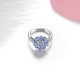 Elegant Sterling Silver Oval Tanzanite Ring with Natural Side Stones, 1.5 Carats - Premium Fine Jewelry by Hennafy Jewel