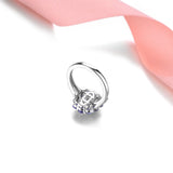 Elegant Sterling Silver Oval Tanzanite Ring with Natural Side Stones, 1.5 Carats - Premium Fine Jewelry by Hennafy Jewel